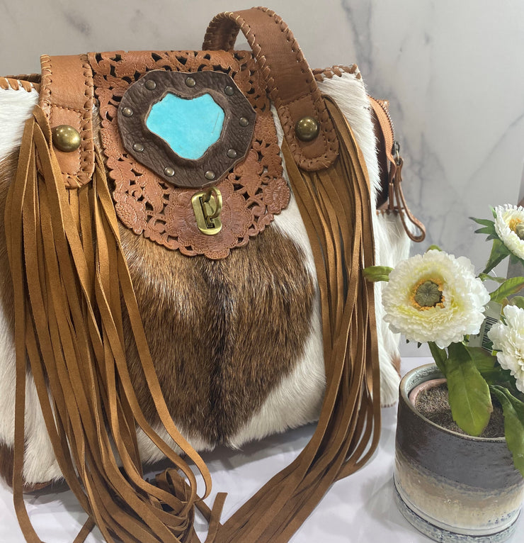 LARGE BROWN COWHIDE TOTE WITH LASER CUT AND TURQUOISE FLAP