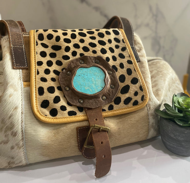 COWHIDE OVERNIGHTER WITH TURQUOISE MEDALLION